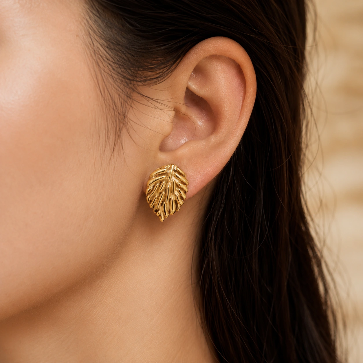 Gold Leaf Stud Earrings worn
