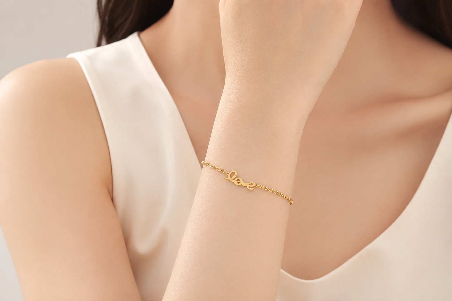 Love Script Chain Bracelet styled on wrist