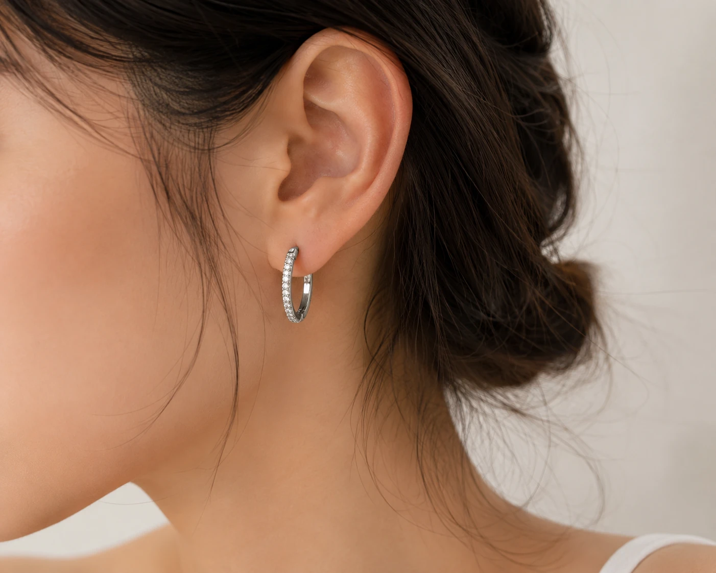 Sparkle Accent Hoop Earrings styled on ear