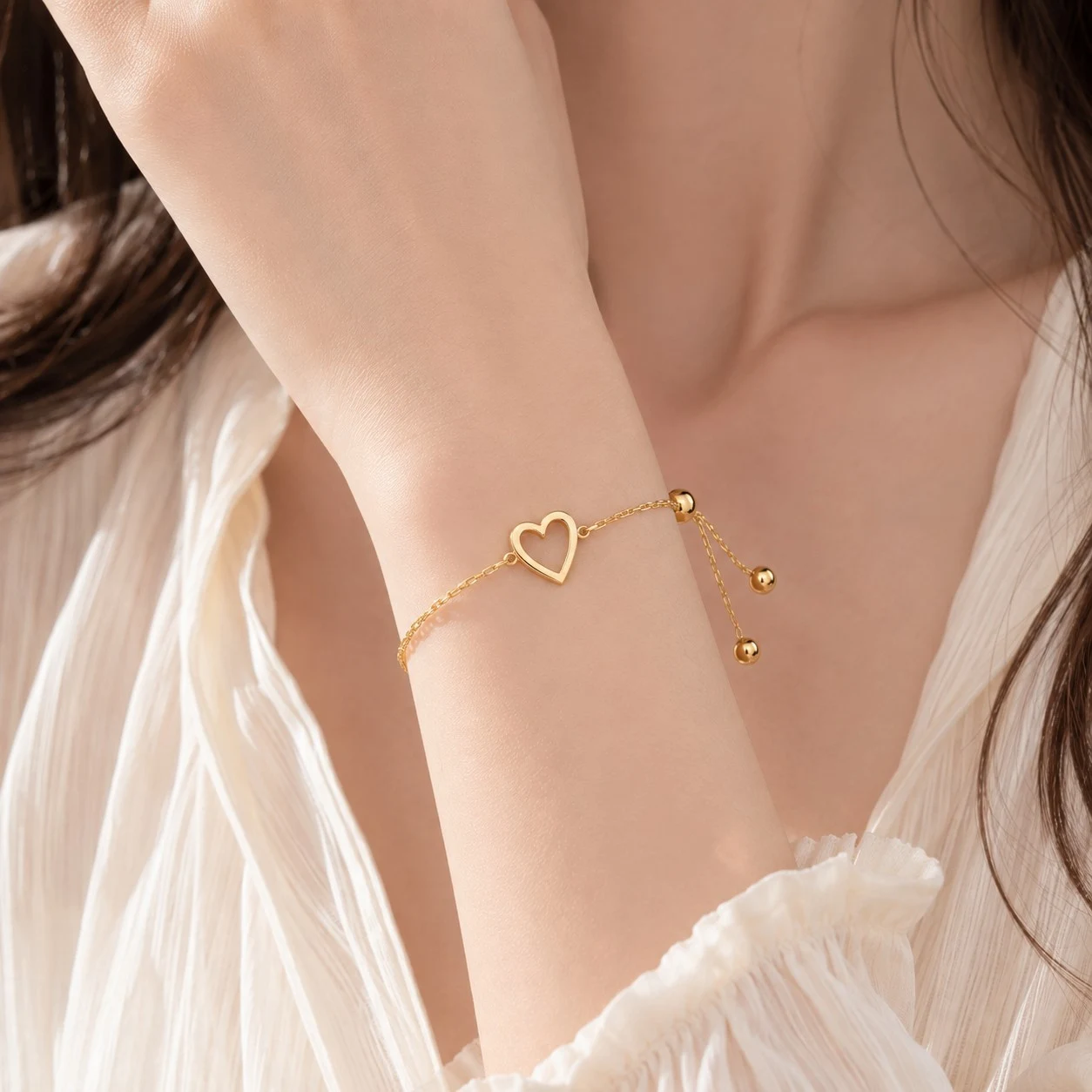 Electroplated Copper Gold-Tone Open Heart Bracelet styled on wrist