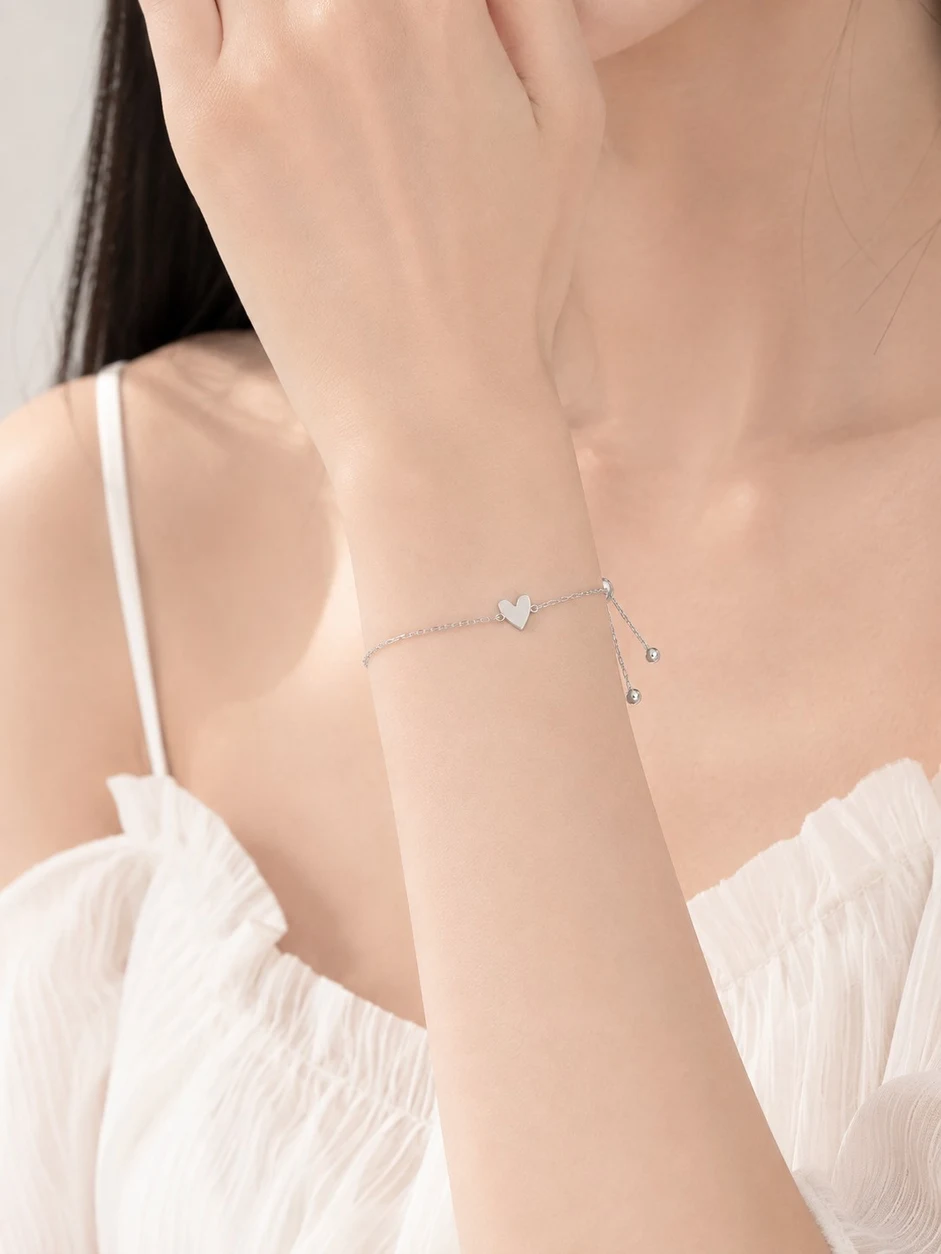 Electroplated Copper Silver-Tone Heart Bracelet styled on wrist
