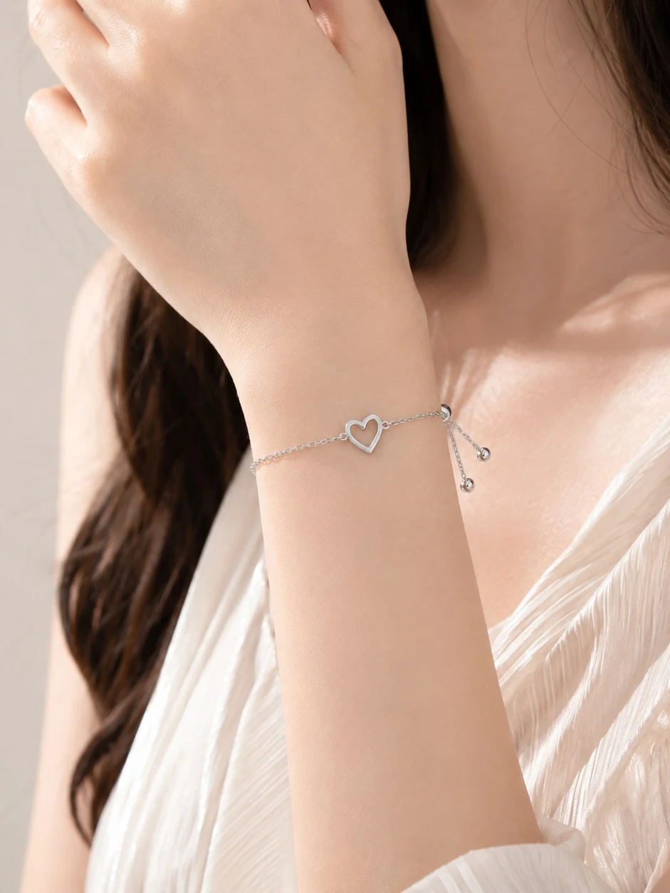 Electroplated Copper Silver-Tone Open Heart Bracelet styled on wrist
