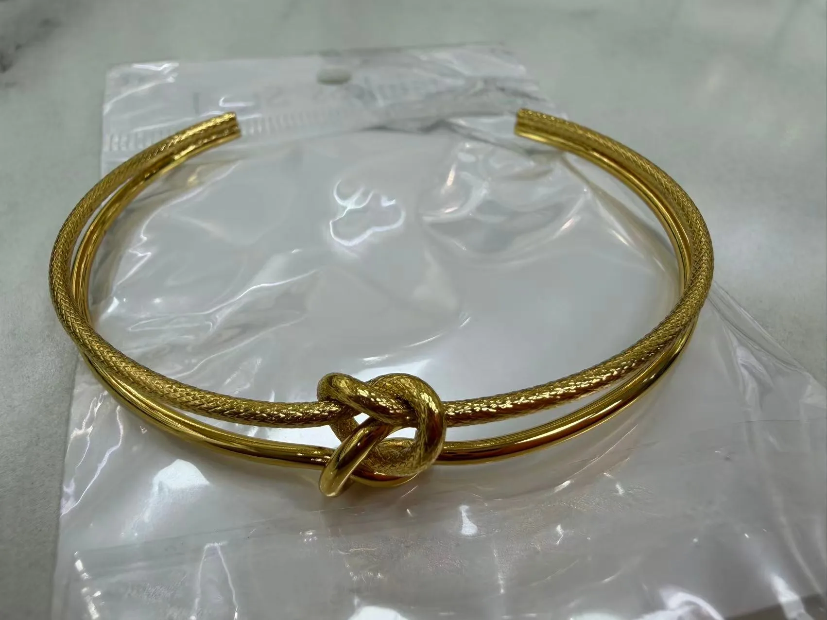Gold-Tone Rope Knot Cuff Bangle